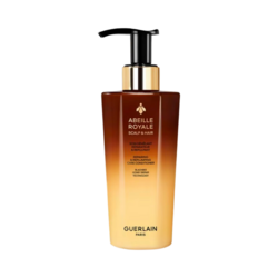 Abeille Royale Repairing and Replumping Care Conditioner on white background