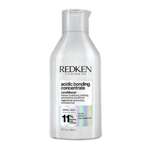 Redken Acidic Bonding Concentrate Conditioner on white background