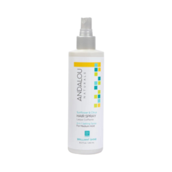 Sunflower and Citrus Brilliant Shine Shampoo on white background